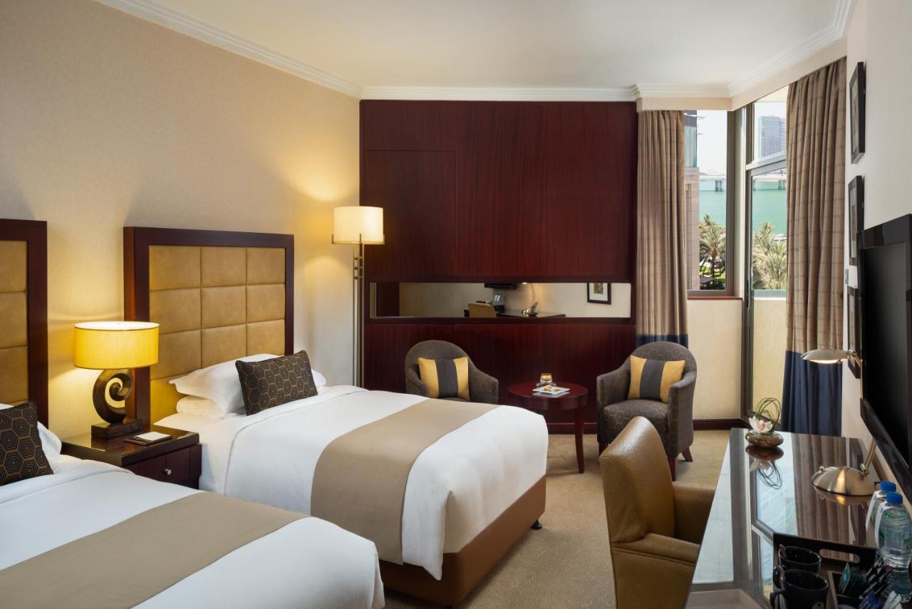 فندق الشاطىء روتانا - أبوظبي أبو ظبي المظهر الخارجي الصورة A room at the Conrad London St. George's Wharf