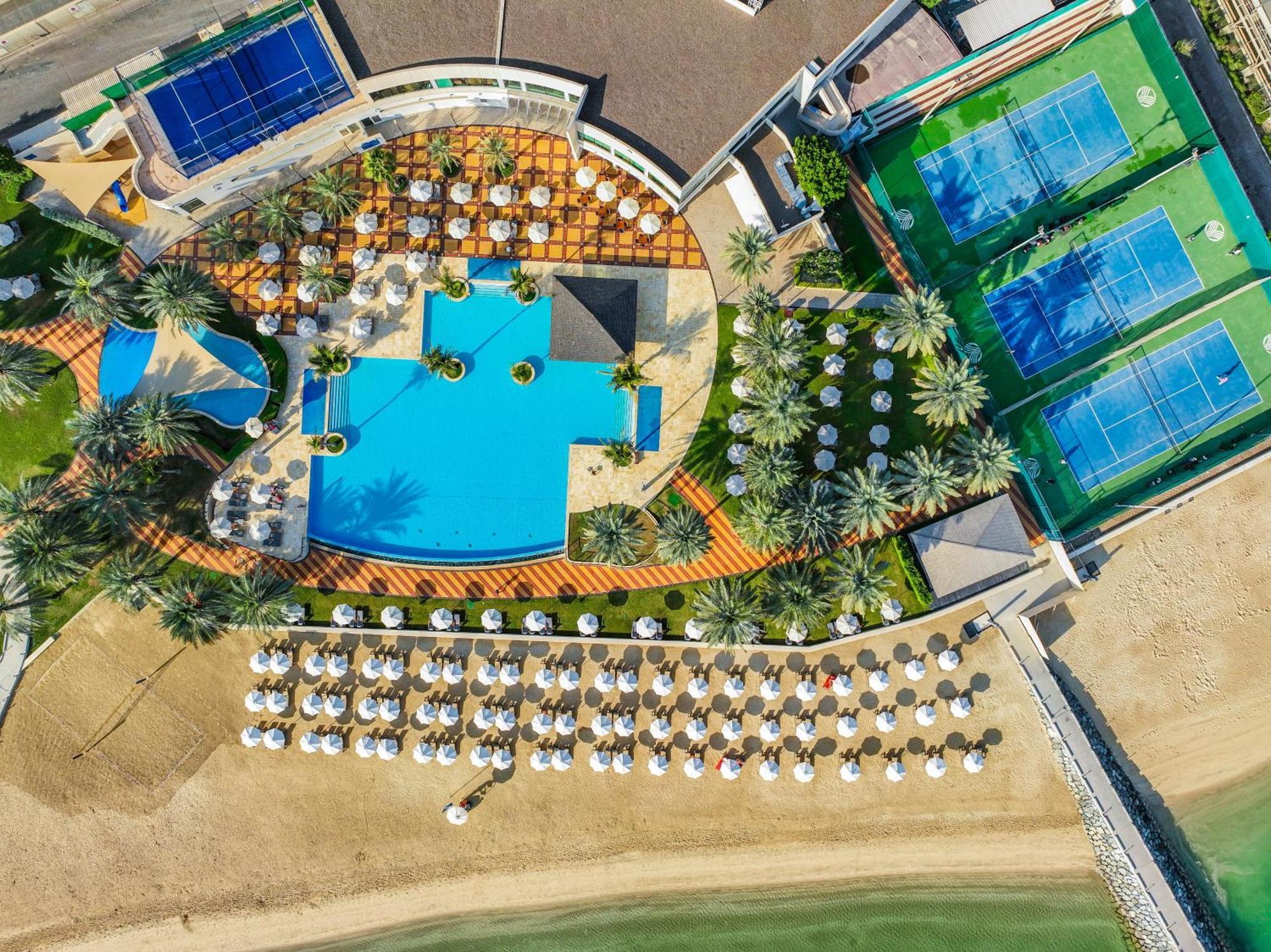 فندق الشاطىء روتانا - أبوظبي أبو ظبي المظهر الخارجي الصورة Aerial view of the Indian Wells Tennis Garden
