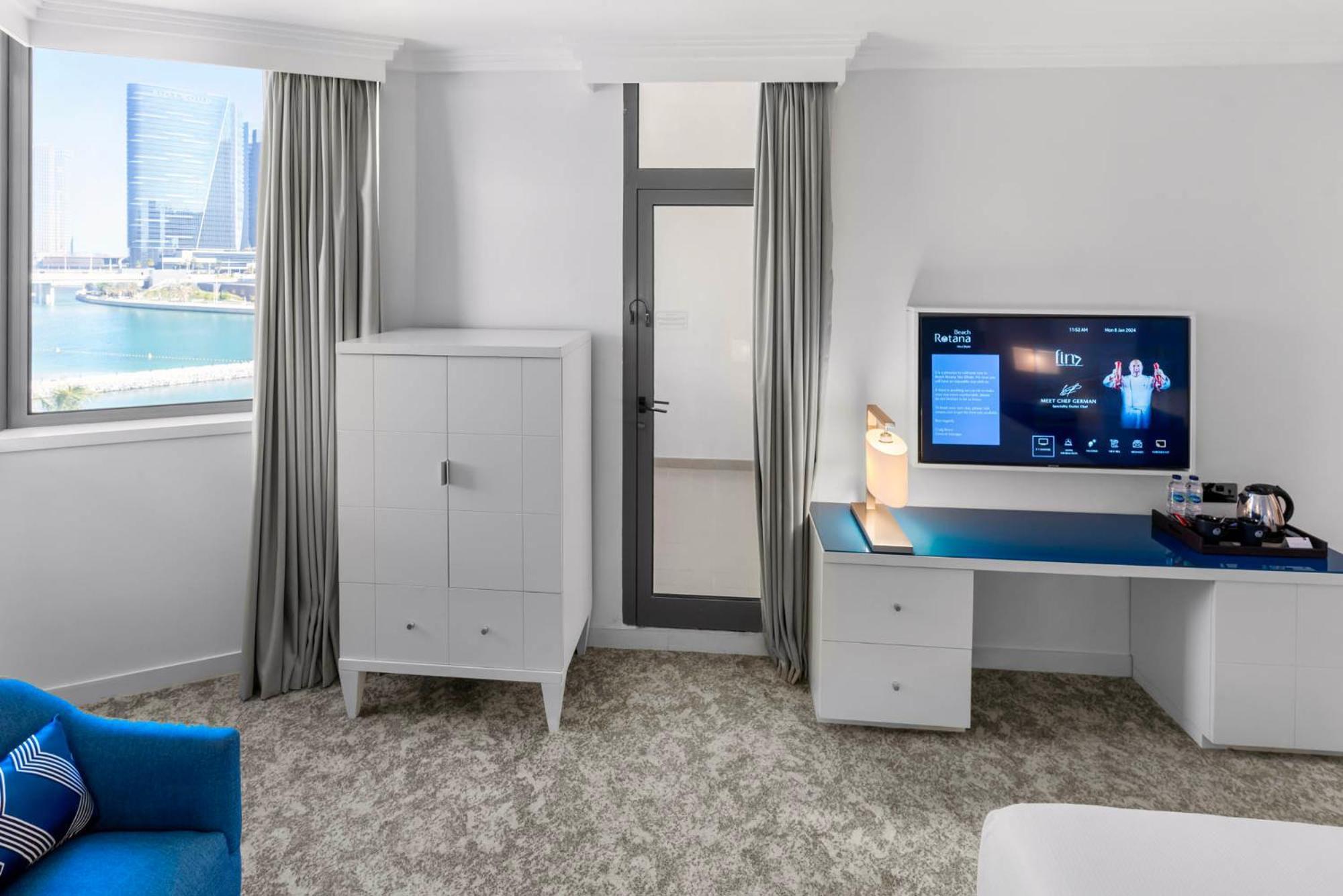 فندق الشاطىء روتانا - أبوظبي أبو ظبي المظهر الخارجي الصورة A typical bedroom in a student residence hall